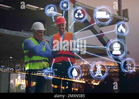 Multiple exposure of professional engineers, scheme and night cityscape Stock Photo