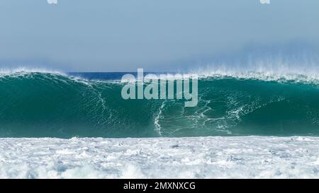 Wave ocean power crashing in vintage black and white contrasts. Stock Photo