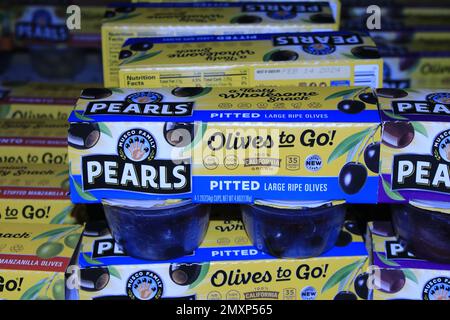 PEARLS Olives to go in boxes in cups ready to go on a shelf Stock Photo