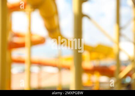 Different colorful slides in water park, blurred view Stock Photo