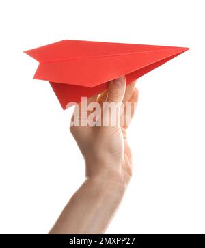 Woman holding red paper plane on white background, closeup Stock Photo