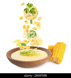 Collage with ingredients falling into bowl of corn soup on white background Stock Photo