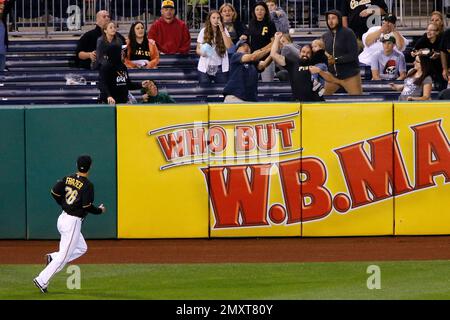 Chicago Cubs third baseman Kris Bryant blows bubblegum while returning to  the dugout during the second inning while playing the Cleveland Indians in  the annual Big League Weekend baseball game at …