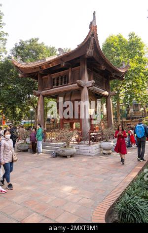 Hanoi, Vietnam, January 2023.  visitors in the large park with the historic buildings inside the temple of literature Stock Photo