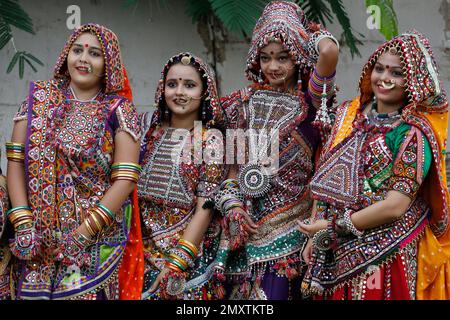 Indian girls practice the Garba dance steps in preparation for the ...