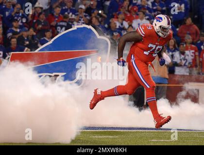 Buffalo Bills offensive tackle Jordan Mills (79) consoles defensive back  Leonard Johnson, left, after losing to the Jacksonville Jaguars in an NFL  wild-card playoff football game, Sunday, Jan. 7, 2018, in Jacksonville