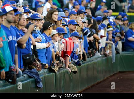 New York Yankees fans Jennifer Stanbrough, right, and Gina Baker, from  Rochester, N.Y., watch batting practice prior to the spring baseball game  between the New York Yankees and the Houston Astros Wednesday