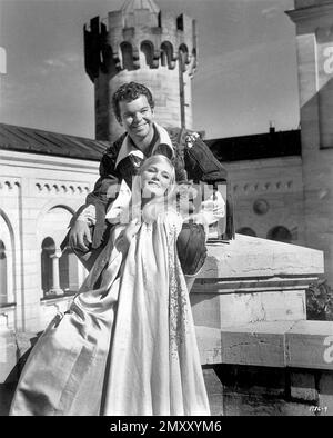 YVETTE MIMIEUX and RUSS TAMBLYN in THE WONDERFUL WORLD OF THE BROTHERS GRIMM (1962), directed by HENRY LEVIN. Credit: M.G.M. / Album Stock Photo