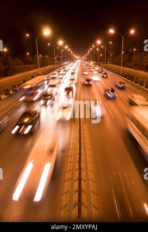 Beijing road traffic at night Stock Photo