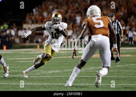 Notre Dame wide receiver Torii Hunter Jr. (16) looks for room to run in  fourth quarter of an NCAA football game. Sunday, September 4, 2016 in  Austin, Tex. Texas won 50-47 in