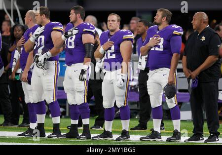 St. Louis Rams players (L to R) Samkon Gado, James Laurinaitis, Randy  McMichael and Richie Incognito stand in their old uniforms before a game  against the Minnesota Vikings at the Edward Jones