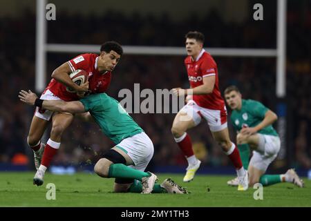 Cardiff, UK. 04th Feb, 2023. Rio Dyer of Wales makes a break. Guinness Six Nations championship 2023 match, Wales v Ireland at the Principality Stadium in Cardiff on Saturday 4th February 2023. pic by Andrew Orchard/Andrew Orchard sports photography/ Alamy Live News Credit: Andrew Orchard sports photography/Alamy Live News Stock Photo