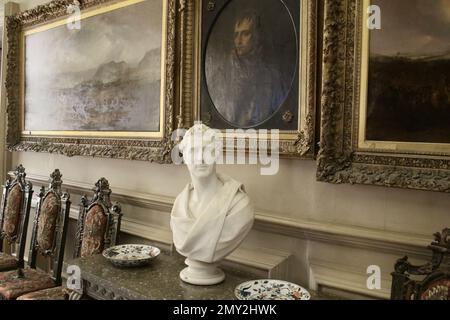 Portrait of Napoleon Bonaparte with a marble bust of the 1st Duke of Wellington in front Petworth House West Sussex England UK Stock Photo