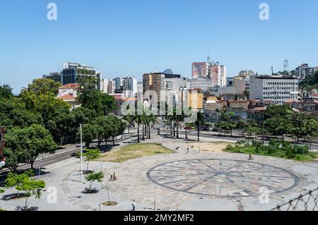 The large Cardeal Camara square viewed from over Carioca aqueduct (Arcos da Lapa) at Republica do Paraguai avenue in Centro district under blue sky. Stock Photo