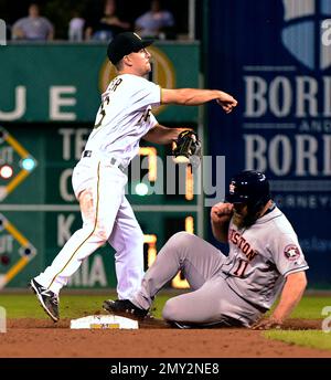 Houston Astros' Evan Gattis watches his sacrifice fly ball during the  fourth inning of a baseball game against the Los Angeles Angels, Tuesday,  June 23, 2015, in Anaheim, Calif. (AP Photo/Jae C.