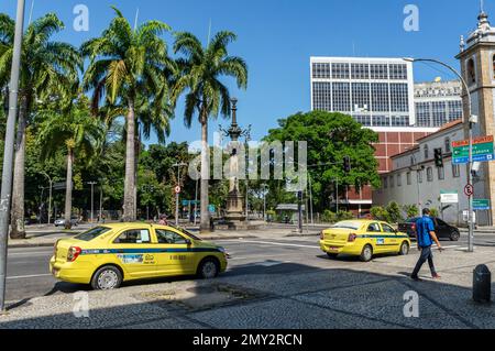 View of Teixeira de Freitas and Visconde de Maranguape streets nearby Cardeal Camara square in Centro district under summer afternoon clear blue sky. Stock Photo