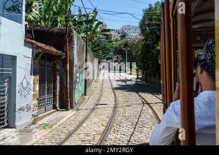 RIO DE JANEIRO - BRAZIL - DEC 15, 2018: View of cobblestone Joaquim Murtinho street during a ride on Santa Teresa tramway in Santa Teresa district und Stock Photo