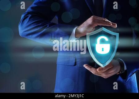 Cyber security concept. Man demonstrating padlock illustration, closeup Stock Photo