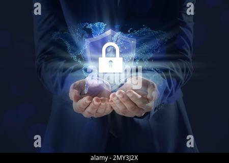 Cyber security concept. Man demonstrating padlock illustration, closeup Stock Photo