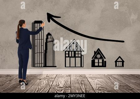 Real estate agent demonstrating prices at housing market. Woman pointing on graph illustration Stock Photo