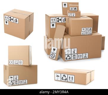 Set of cardboard boxes with packaging symbols on white background Stock Photo