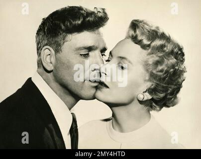 American actor Burt Lancaster and actress Deborah Kerr in the movie From Here to Eternity, USA 1953 Stock Photo