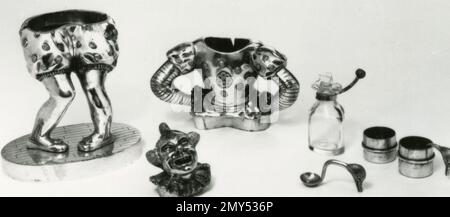 Silver cruet set in the form of great clown Joseph Grimaldi, with parts of the body removable, UK 1980s Stock Photo