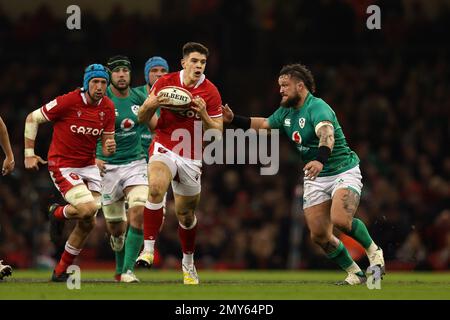 Cardiff, UK. 04th Feb, 2023. Joe Hawkins of Wales makes a break. Guinness Six Nations championship 2023 match, Wales v Ireland at the Principality Stadium in Cardiff on Saturday 4th February 2023. pic by Andrew Orchard/Andrew Orchard sports photography/ Alamy Live News Credit: Andrew Orchard sports photography/Alamy Live News Stock Photo
