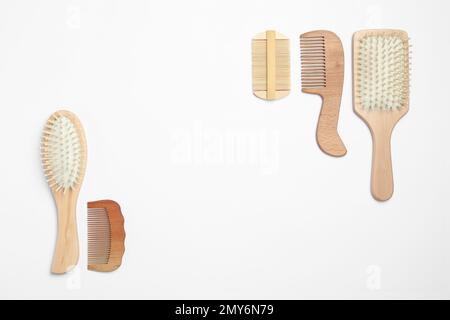 Composition with hair combs and brushes on white background, top view Stock Photo