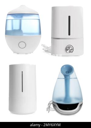 Set of modern air humidifiers on white background Stock Photo