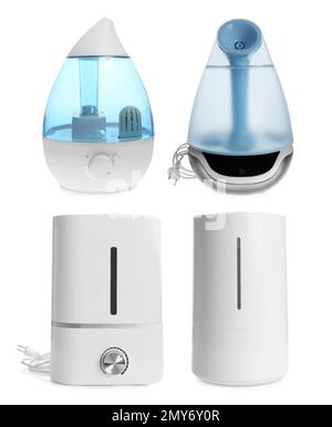 Set of modern air humidifiers on white background Stock Photo