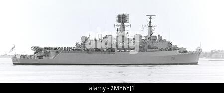 HMS Antrim (D18) a County-Class destroyer of the British Royal Navy approaching Portsmouth Harbour, Portsmouth on 5th August 1983. Stock Photo