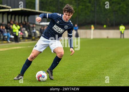 Swansea, Wales. 4 February 2023. Oliver Evans of Millwall under pressure  from Zane Myers of Swansea City during the Professional Development League  game between Swansea City Under 18 and Millwall Under 18