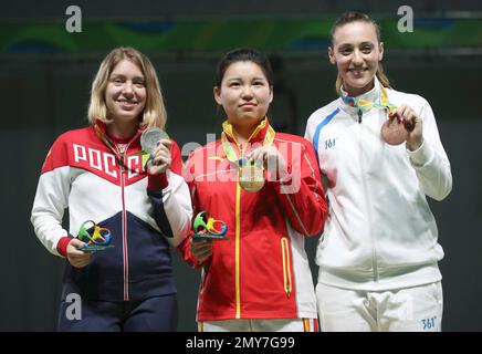 Vitalina Batsarashkina, left, of Russia, Zhang Mengxue, center, of ...