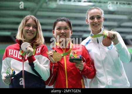 Vitalina Batsarashkina, left, of Russia, Zhang Mengxue, center, of ...