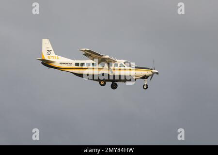 Everett, WA, USA - February 3, 2023; Kenmore Air Express Cessna fixed wing single engine plane landing in moderate turbulance Stock Photo