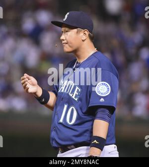 Seattle Mariners first baseman Dae-Ho Lee bats reacts after