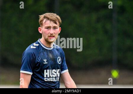 Swansea, Wales. 4 February 2023. Geoffroy Bony of Swansea City battles for  possession with Kyron Horsley-McKay of Millwall during the Professional  Development League game between Swansea City Under 18 and Millwall Under