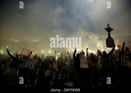 Fans of Atletico Nacional celebrate at the end of a second leg