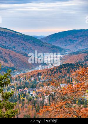 Scenic landscape view with small mountain town resorts located between the mountains on Prahova Valley, Romania Stock Photo