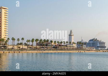 MALAGA, SPAIN - OCTOBER 12, 2021: View of the port and lighthouse of Malaga, Andalusia, Spain Stock Photo