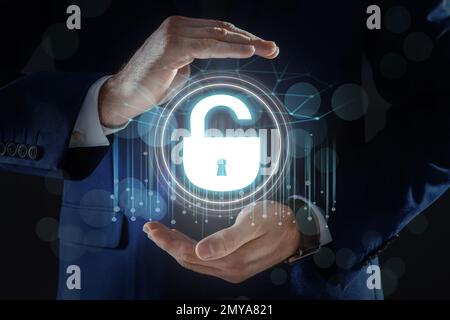 Cyber security concept. Man demonstrating padlock illustration, closeup Stock Photo