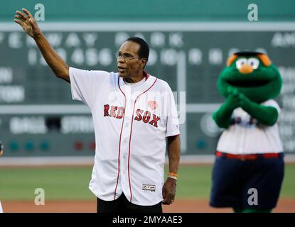Minnesota Twins Hall of Famer Rod Carew waves to fans before throwing out  the ceremonial first pitch before the team's home opener against the  Chicago White Sox in a baseball game Monday