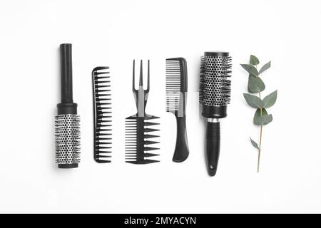 Composition with hair combs and brushes on white background, top view Stock Photo