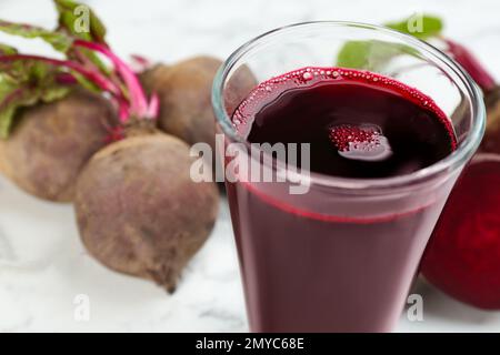 Freshly made beet juice on table, closeup Stock Photo