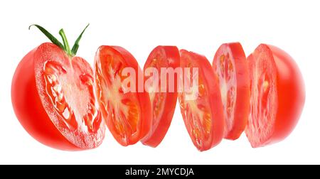 Cut tomato in air on white background Stock Photo