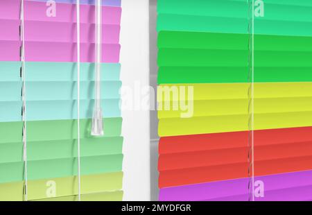 Closed multicolor window blinds as background, closeup view Stock Photo