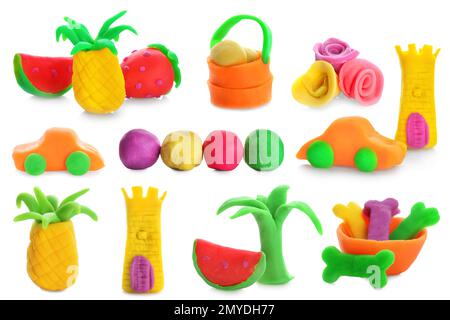 Collection of small figures made from play dough on white background Stock Photo