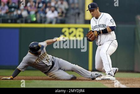 Seattle Mariners first baseman Dae-Ho Lee reacts after a ball hit