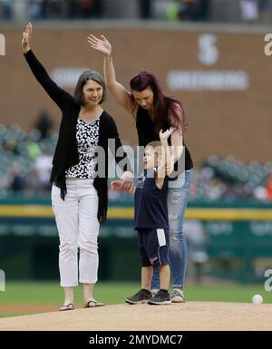 Ann Fidrych, left, widow of Detroit Tigers pitcher Mark Fidrych; her  daughter Jessica; and grandson David wave after delivering the game ball to  the mound before a baseball game between the Detroit